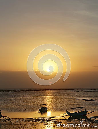 The view of the sunrise at Jimbaran Beach, Bali, Indonesia Stock Photo