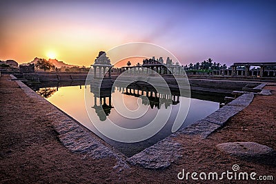 View of sunrise at Pushkarni, Sri Krishna tank in ruins. Hampi, karnataka, India Stock Photo