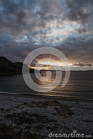View of sunset from Ardmair Beach, Scotland. Stock Photo