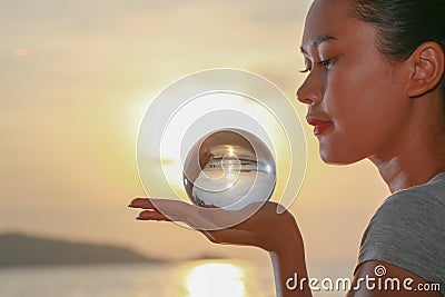 View of sunset inside crystal ball Stock Photo