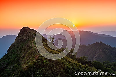 View of sunset over the Phu Chi Fah see from Phu Chi Dao viewpoint in Chiang Rai, Thailand. Stock Photo