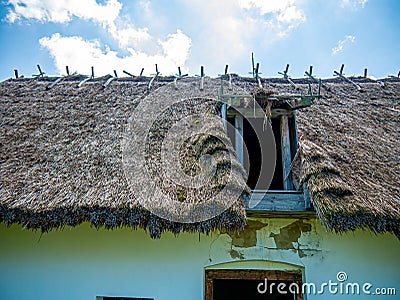 View on the tatched roof of a traditional hungarian pise house Editorial Stock Photo