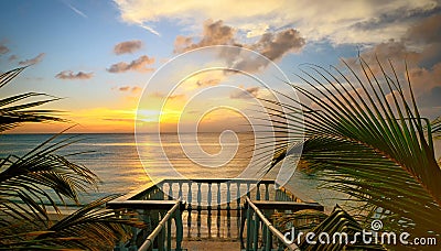 The view from the terraces of the beautiful sunset on the beach. Stock Photo