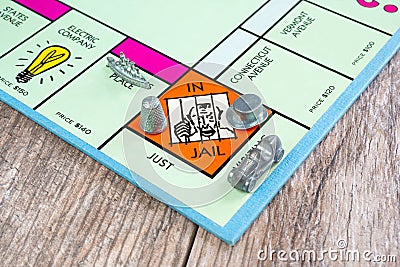 Tokens in jail square Editorial Stock Photo