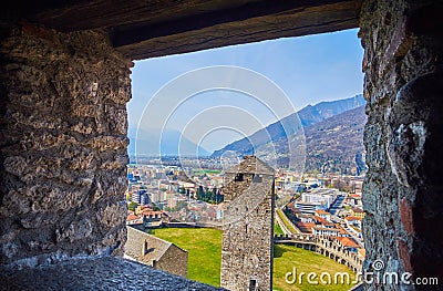 The view throuth the small window on the Torre Nera tower of Castelgrande fortress, Bellinzona, Switzerland Editorial Stock Photo