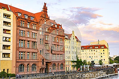 View to historic buildings on the banks of the River Spree, which belong to the medieval Nikolai quarter in Berlin, Germany Editorial Stock Photo
