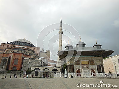 View to historical Fountain of the Ahmed III and Hagia Sophia mosque and museum in background, Istanbul Editorial Stock Photo