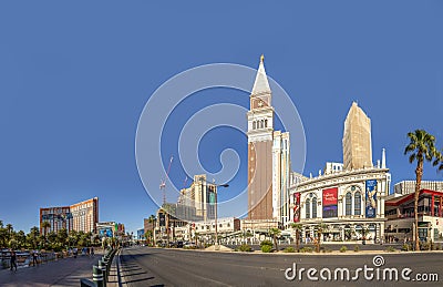 view to hotels and casinos at the Strip in daytime with neon advertising and the Venetian tower in the middle Editorial Stock Photo