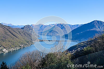 The View to the Lake Lugano and the surrounding Mountains from Serpiano, Ticino, Switzerland Stock Photo