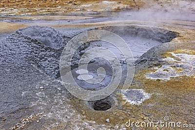 View to a mudpot, or mud pool, Iceland. Stock Photo