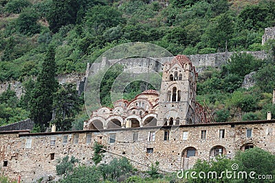 View to the Pantanassa Monastery surrounded by ruins of abandoned byzantine town Mystras, Greece Stock Photo