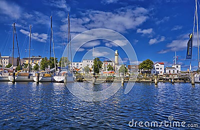 View to the port and old lighthouse in WarnemÃ¼nde, Rostock, Germany Editorial Stock Photo