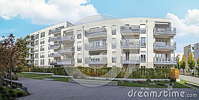 View to residential area with ecological and sustainable green residential buildings, low-energy houses with apartments and green Stock Photo