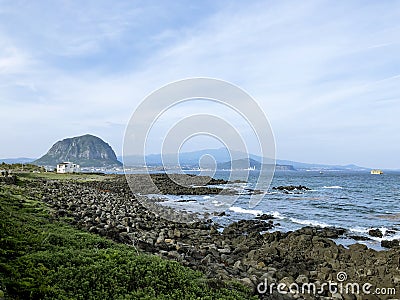 View to Sanbangsan Mountain from the coast of Jeju island. South Korea Stock Photo