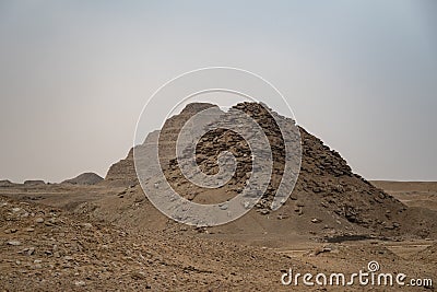 View to Userkaf pyramid with Step pyramid of Djoser at background. Archeological remain in the Saqqara necropolis, Egypt Stock Photo