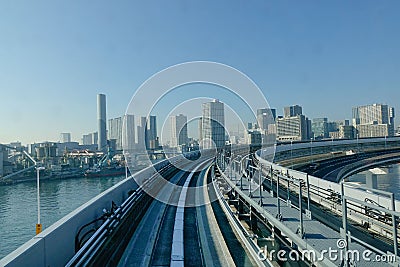View of Tokyo Bay with many buildings and skytrain track at Odaiba island, Toyko Editorial Stock Photo