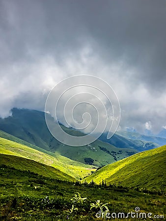 View from a top of the mountain on a cloudy day Stock Photo