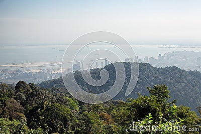 Lookng down through very heavy pollution haze to the city of George Town on Penang Island Stock Photo