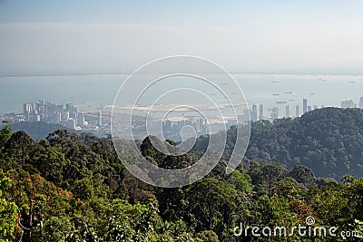 Lookng down through very heavy pollution haze to the city of George Town on Penang Island Stock Photo