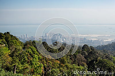 Lookng down through very heavy pollution haze to the city of George Town on Penang Island Stock Photo