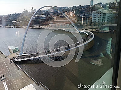 A view towards Newcastle upon Tyne including the millennium bridge, river Tyne and quayside Editorial Stock Photo