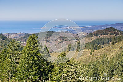 View towards the Pacific Ocean and Pillar Point Harbor from Purisima Creek Redwoods Park on a clear day, California Stock Photo