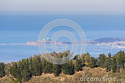 View towards the Pacific Ocean and Pillar Point Harbor from Purisima Creek Redwoods Park on a clear day, California Stock Photo