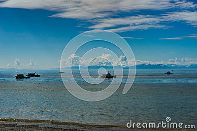 View towards sea with blue sky and a few clouds in Alaska United Editorial Stock Photo