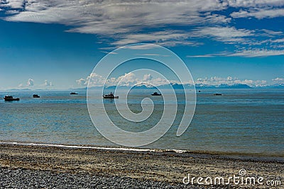 View towards sea with blue sky and a few clouds in Alaska United Editorial Stock Photo