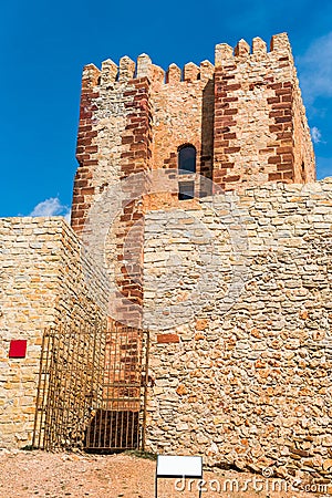 View of the tower Castillo de Molina de Aragon in Guadalajara province, Spain. Copy space for text. Vertical. Stock Photo