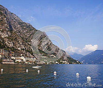 View on a town Limone on lake Garda and the Alpes. Stock Photo