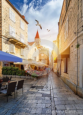 View at town Trogir, old touristic place in Croatia Europe with seagull's flying over city. Trogir town coastal view. Magnificent Editorial Stock Photo