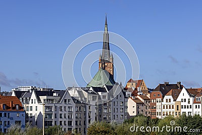 View of townhouses on Piastowski Boulevard, in the background a tower of Szczecin Cathedral, Szczecin, Poland Editorial Stock Photo