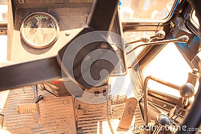 view of tractor dashboard with handles sticks pedals Stock Photo