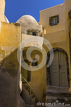 A view of traditional dwellings in the backstreets of the village of Emporio, Santorini Stock Photo