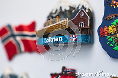 View of traditional tourist souvenirs and gifts from Lofoten Islands, Nordland, Norway, fridge magnets with text Editorial Stock Photo