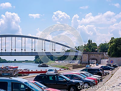 View on the traffic and the Tisza river and the Belvarosi bridge in Szeged, Hungary on a sunny day Editorial Stock Photo