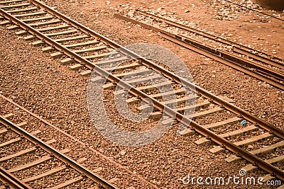 View of train Railway Tracks from the middle during daytime at Kathgodam railway station in India, Train railway track view, Stock Photo