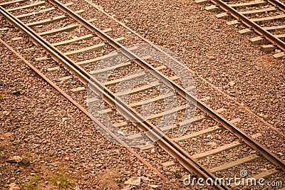 View of train Railway Tracks from the middle during daytime at Kathgodam railway station in India, Train railway track view, Stock Photo