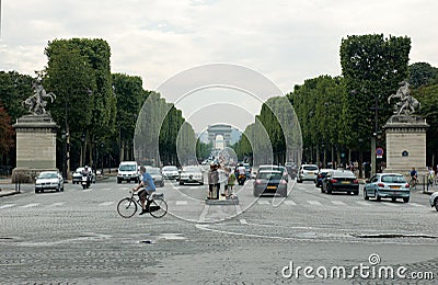 View of the Trumphal Arch in Paris from the Place de la Concorde through the Champs Elysees Stock Photo