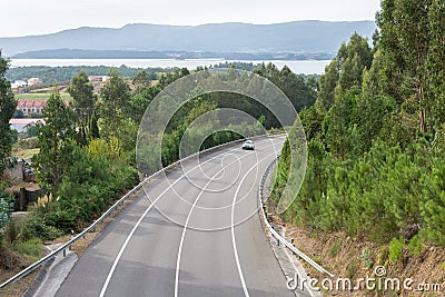 View of the turn of the highway between the mountains Stock Photo