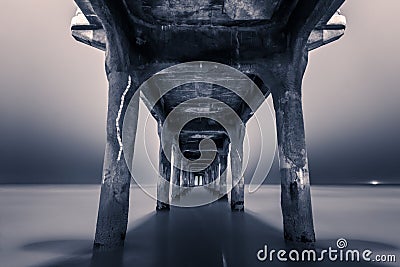 View from under Manhattan Beach Pier Stock Photo