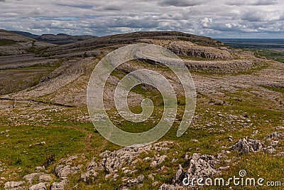 A view of the unique Sliabh Rua, Red Mountain from Mullaghmore Mountain in The Burren National Park Stock Photo