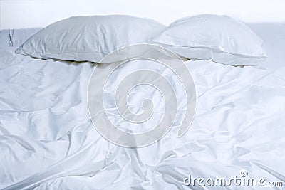 View of unmade bed Stock Photo