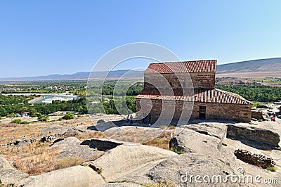 View of Uplistsikhe Cave Town and Church of Prince Near Gori, Georgia Stock Photo