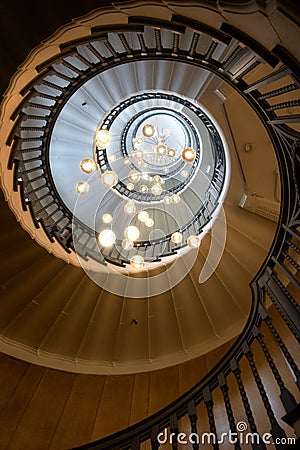 view upward spiral staircase with beautiful light Stock Photo