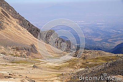 View of valley and smog from volcan Popocatepetl eruption from volcan Iztaccihuatl Stock Photo