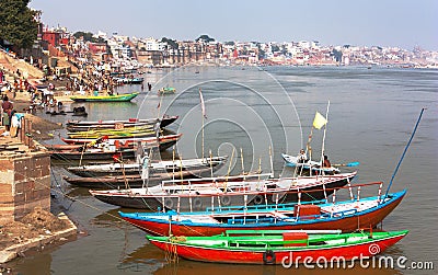 View of Varanasi with boats on sacred Ganga River Stock Photo