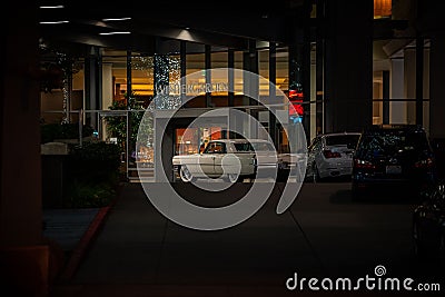 View of vehicles parked before the Wintergarden building in Everett Editorial Stock Photo