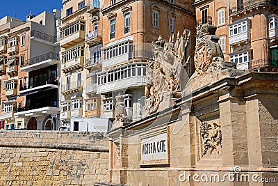 Victoria Gate and town buildings, Valletta. Editorial Stock Photo